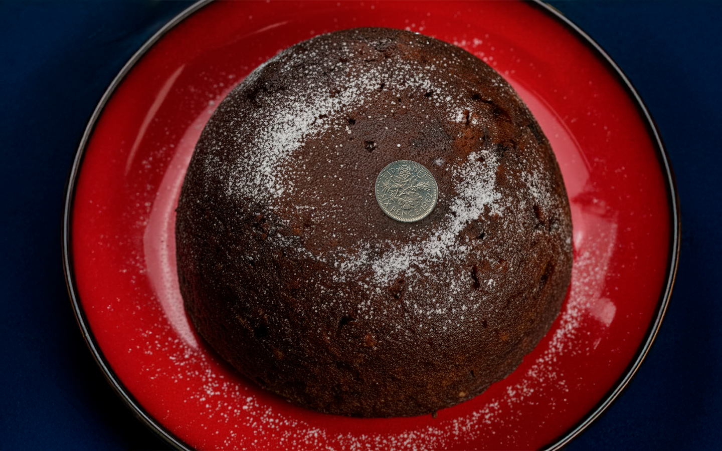 O Natal inglês que esconde uma moeda na sobremesa